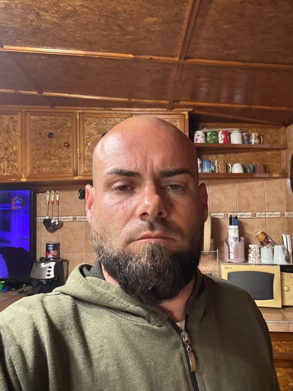 Man documents morning routine with selfies in Bulgarian home