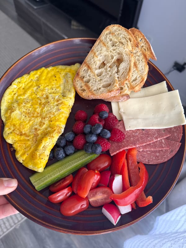 Person prepares omelet breakfast with fresh coffee in Gatineau