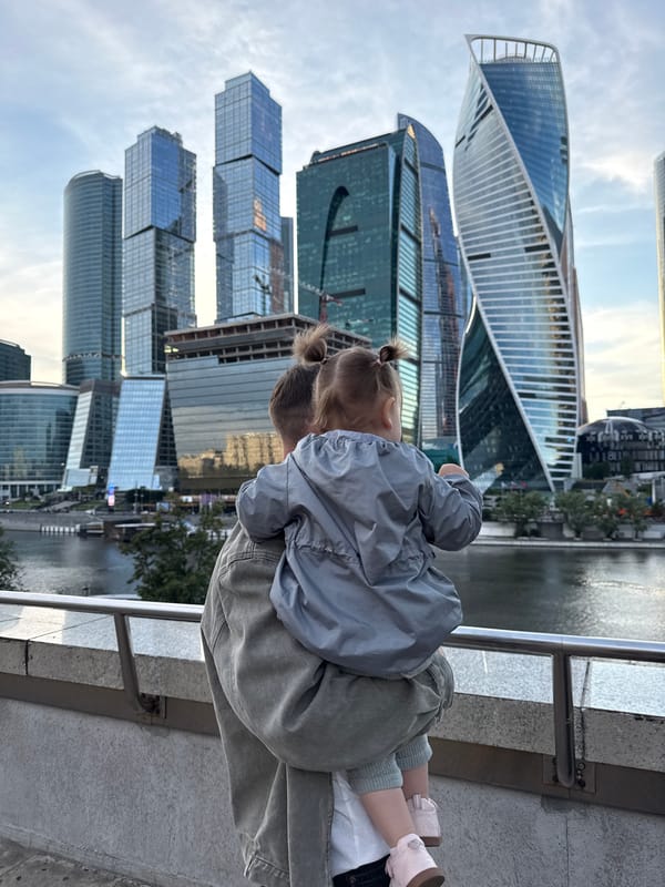 Family afternoon at Moscow City's riverside skyscraper district