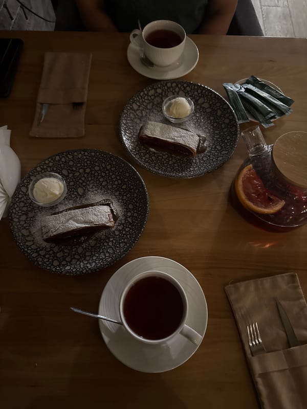 Cafe patron enjoys pastry and tea in Uryupinsk
