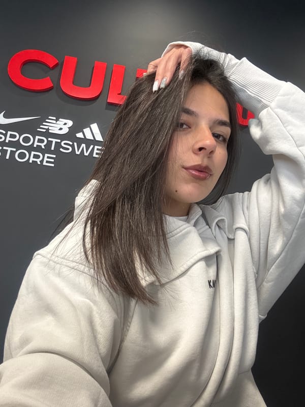 Woman poses for photos in Gabrovo sporting goods store