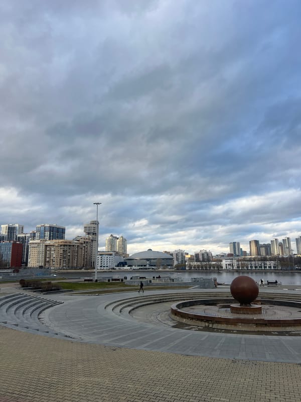 Fountain with brown sphere documented in Yekaterinburg city center
