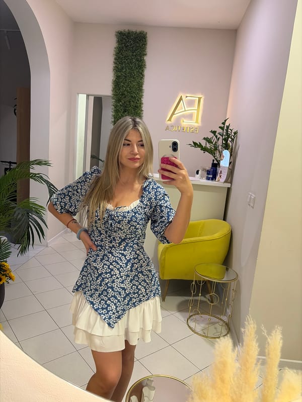 Mirror selfie and device welcome screen at Budva accommodation