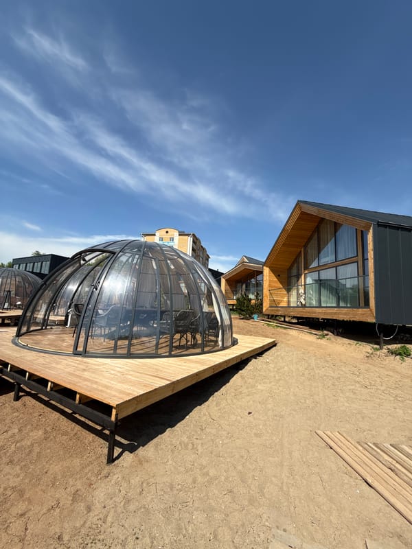 Modern waterfront architecture and urban scenes documented in Votkinsk