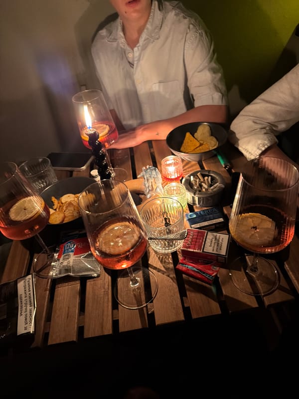 Friends gather for candlelit drinks on Belgrade balcony