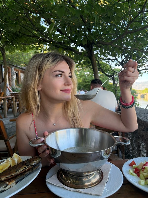 Couple enjoys lakeside lunch in Podgorica, Montenegro