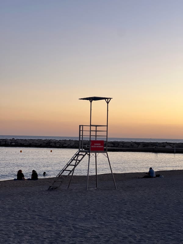 Marseille Beach Captured at Dusk with Calanques Backdrop
