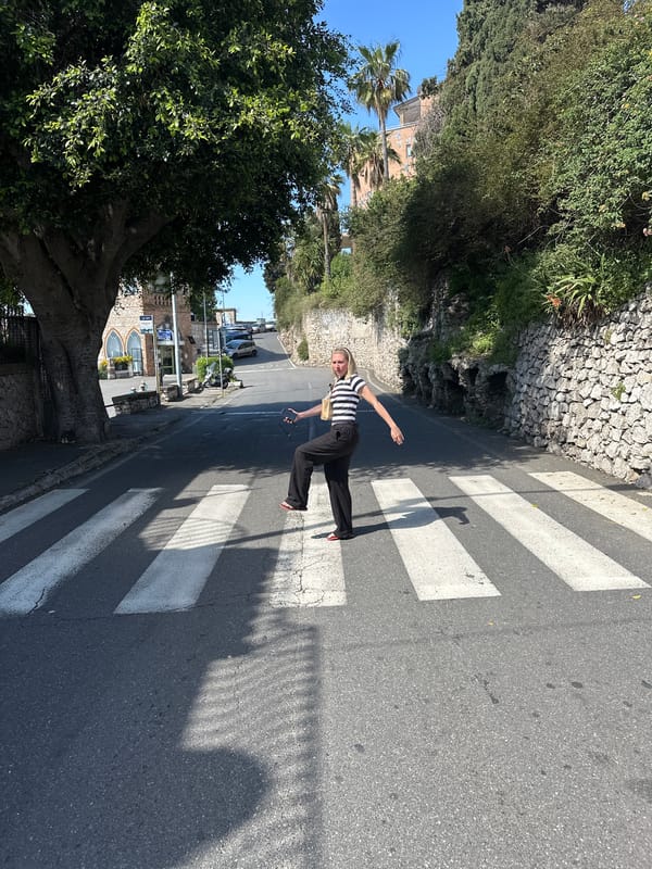 Woman poses for social media challenge in Taormina, Italy