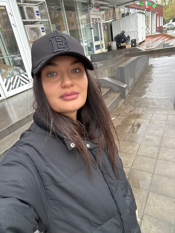 Woman photographed multiple times in rainy Krasnogorsk morning