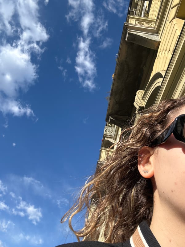 Street scenes captured in Turin featuring people and parked cars