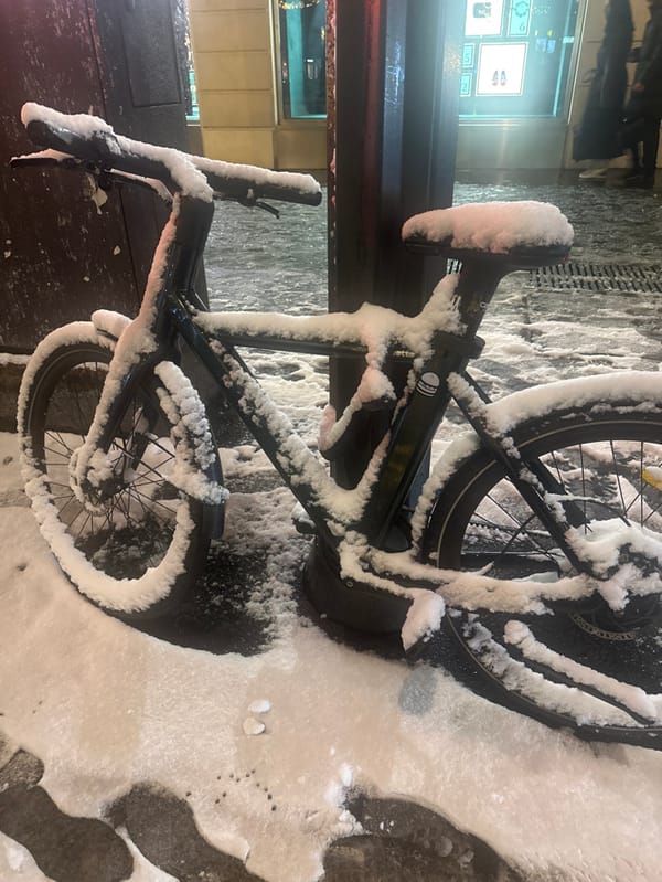 Snow-covered electric bike spotted in snowy Paris street