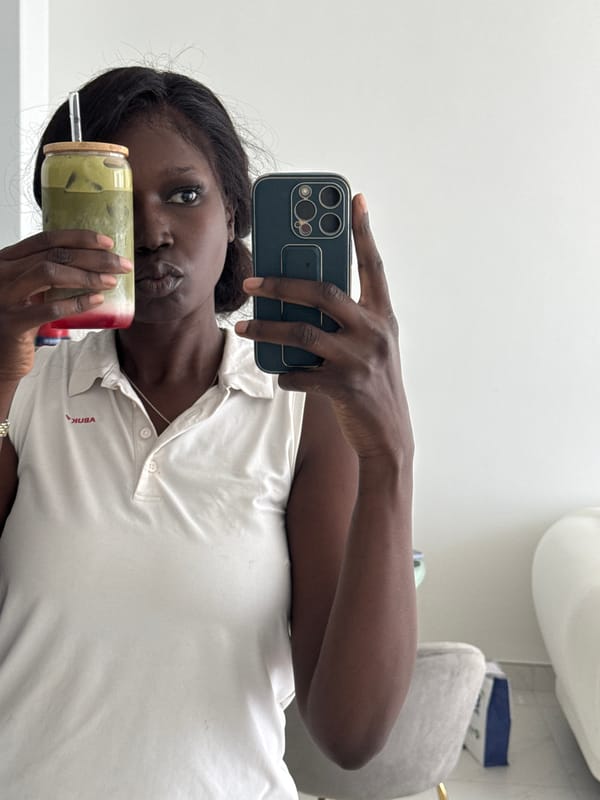 Woman takes selfie with beverage in Dubai