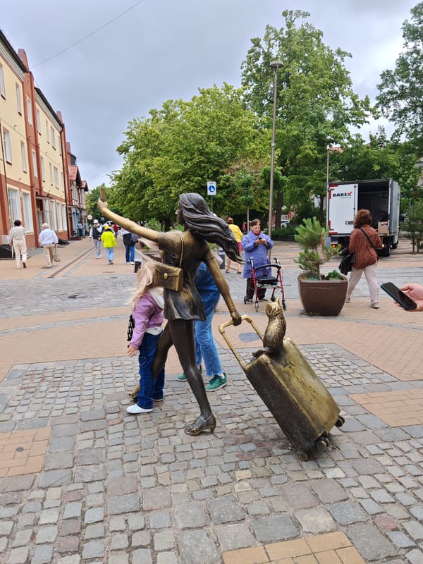 Exploring a Baltic coastal town's street art, cat statues, and history museum