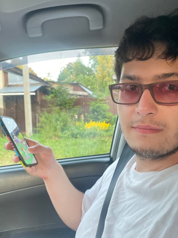 Cruising Votkinsk streets, phone out, vape in hand