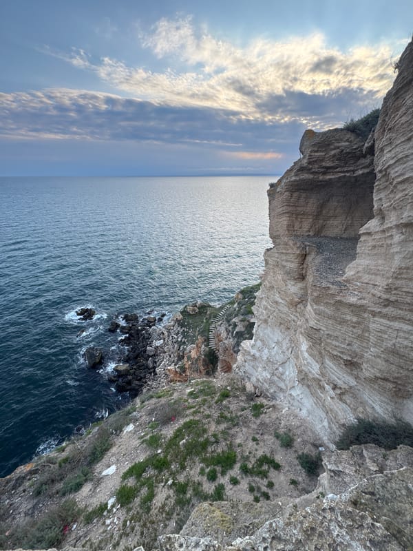 Woman visits clifftop memorial site near Balgarevo, Bulgaria