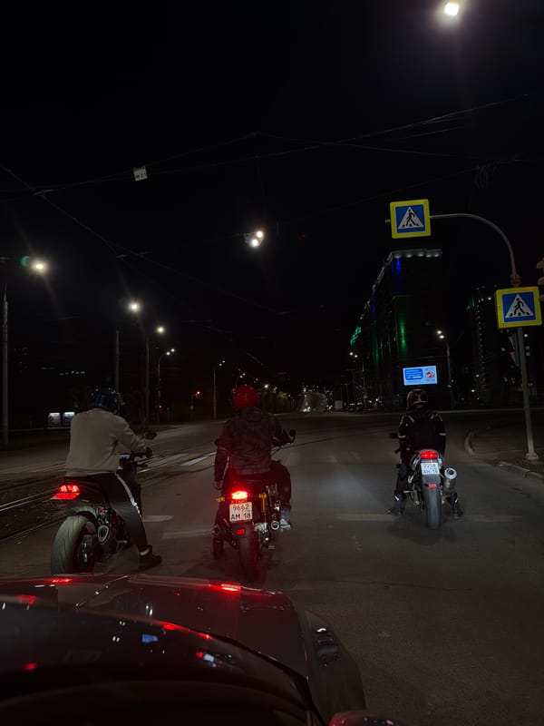 Motorcycles gather at nighttime intersection in Izhevsk, Russia