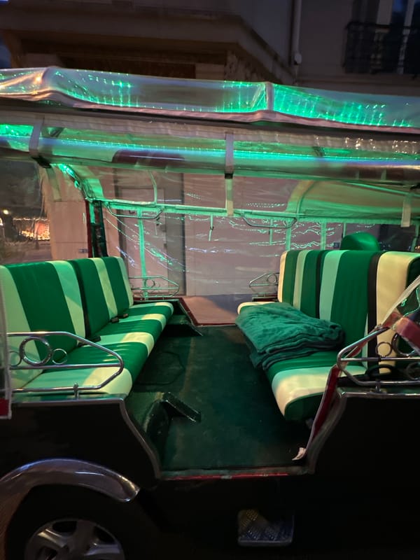Decorated tuk-tuk interior documented in Paris