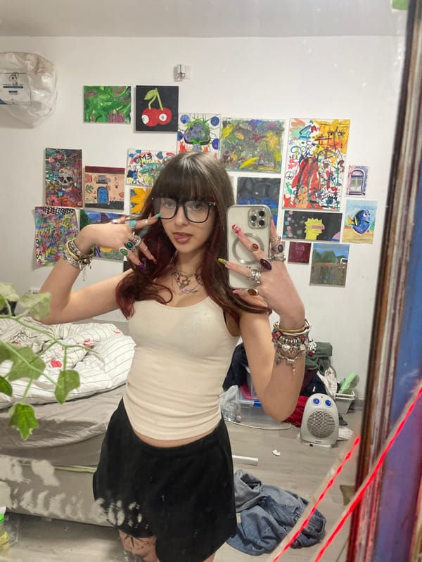 Woman takes mirror selfies showcasing jewelry collection in Raanana