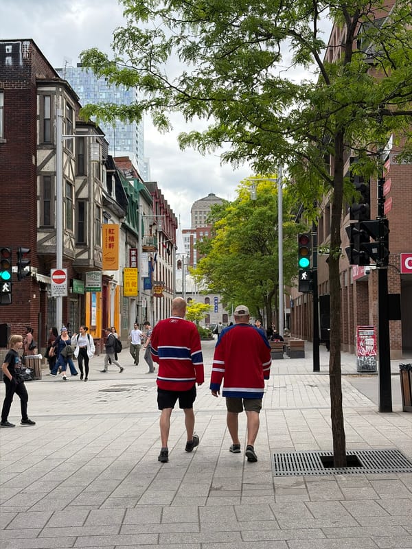 Evening pedestrian activity documented in Montreal's Chinatown district