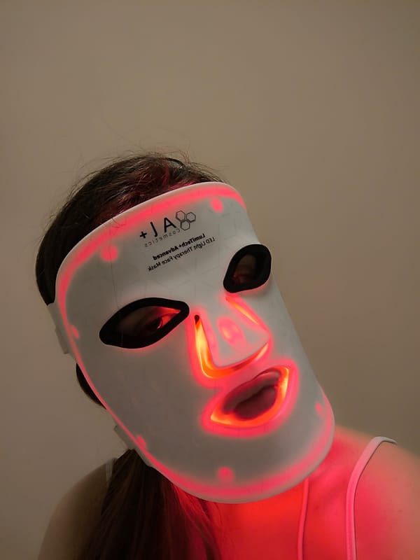 Person spotted wearing LED facial mask with red lights