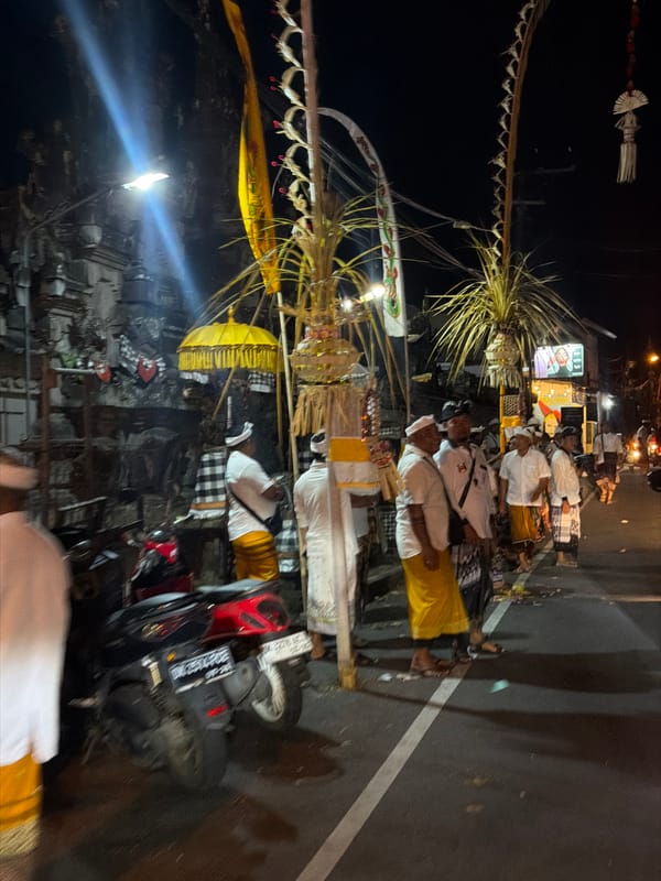 Traditional Balinese gathering on a street in Mengwi at night