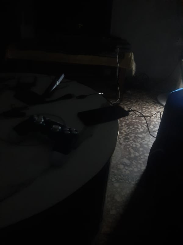 Gaming controller on a table in a low-lit room