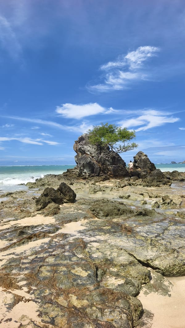 Peaceful morning scenes captured at Kute Indonesia rocky coastline