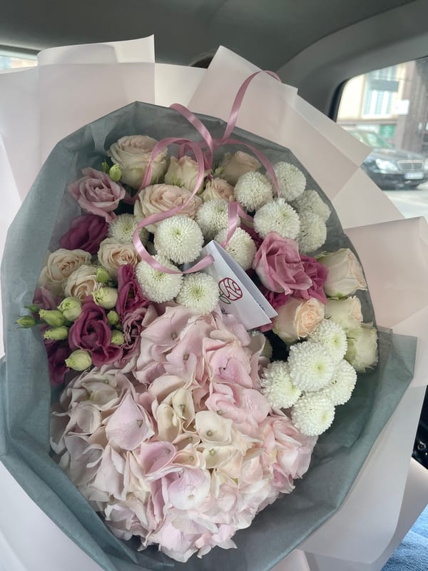 Urban car journey documented with roses, street scenes, construction