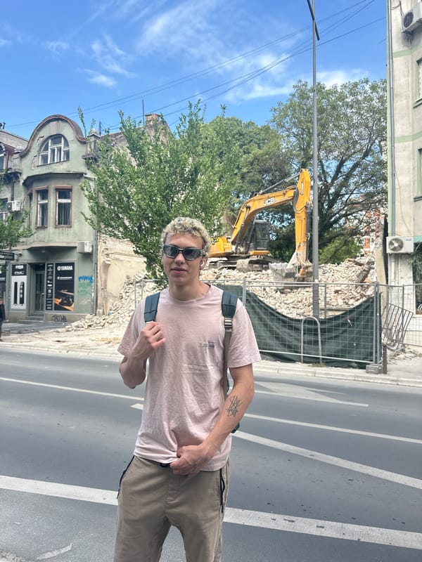 Young man photographed on street in Novi Sad, Serbia