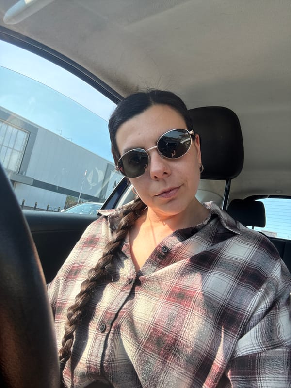 Woman takes selfie in vehicle in Great Yarmouth