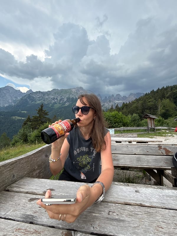 Chilling at Molveno's lakeside benches with Alpine views