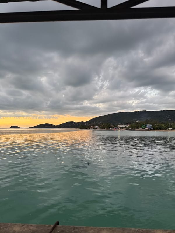 Seatran ferry departure from Nathon pier at sunset