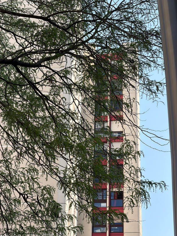 Créteil brutalist towers and street life on a summer afternoon