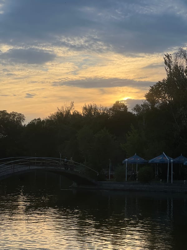 Sunset at a Yerevan lakeside park, Venice cafe nearby