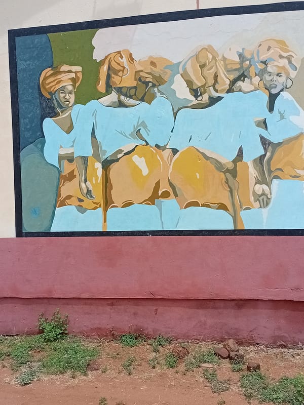 Wall painting with multiple figures spotted in Lokoja, Nigeria