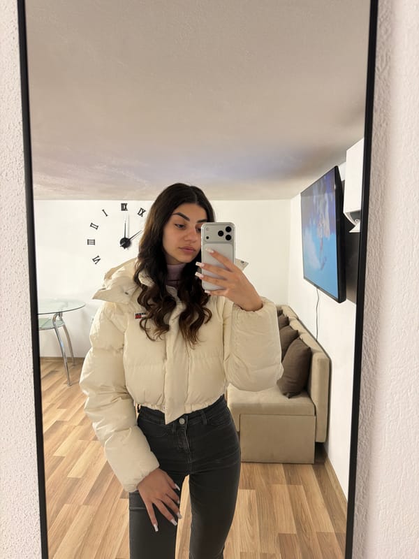 Woman takes mirror selfies in Gabrovo, Bulgaria morning