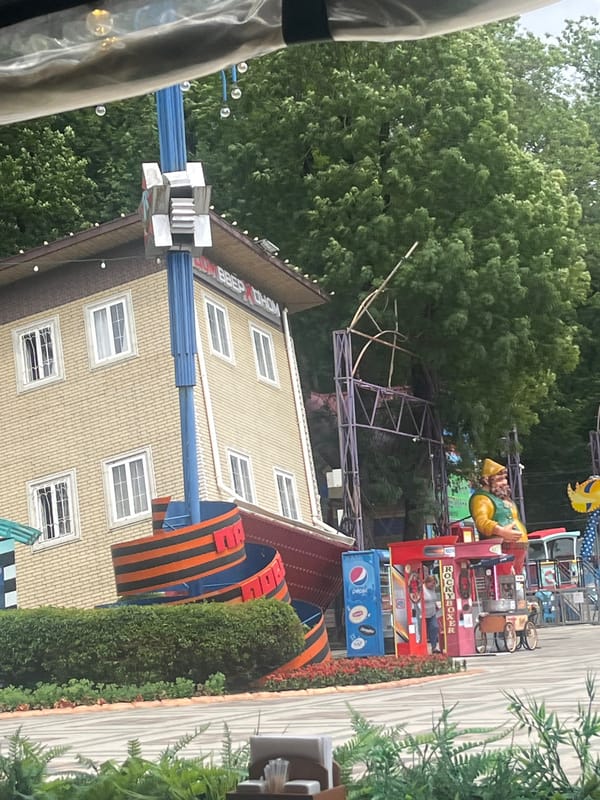 Café table and fairground scenes at a Stavropol amusement park
