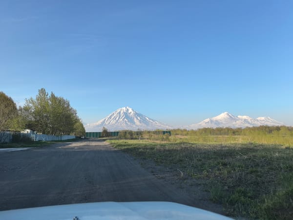 Witness captures scenic mountain landscape under clear skies