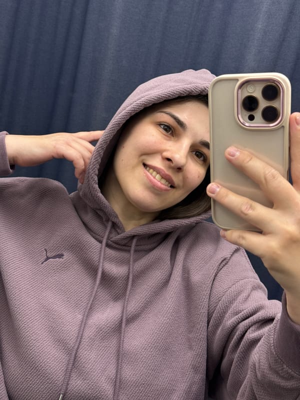 Woman takes selfie in Krasnoyarsk sports store