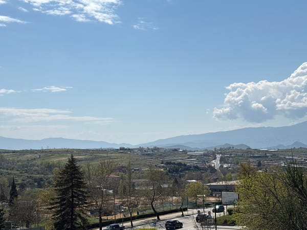 Daytime traffic scene captured in Sandanski, Bulgaria