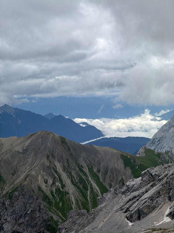 Rugged alpine panorama above Wildermieming under cloudy skies