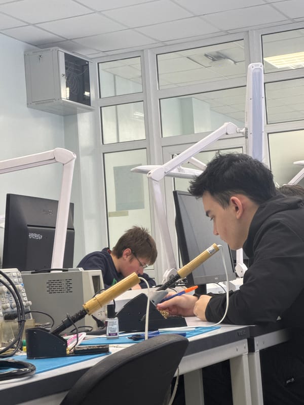 Late-night electronics work captured in Perm laboratory facility