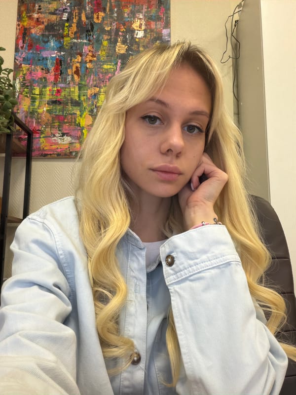 Portrait of blonde woman in denim jacket captured in Moscow