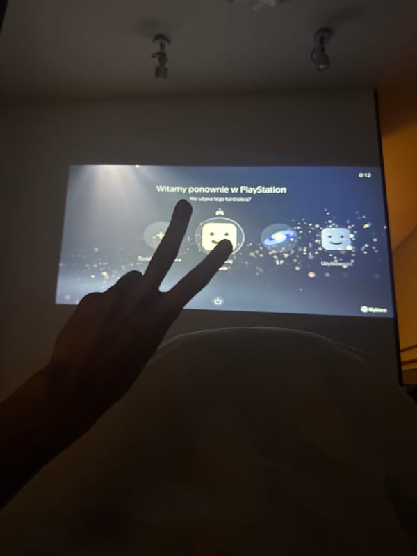 Gaming moment captured in Warsaw with peace sign gesture