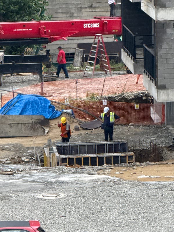 Construction underway in Tbilisi, crane and crew on site