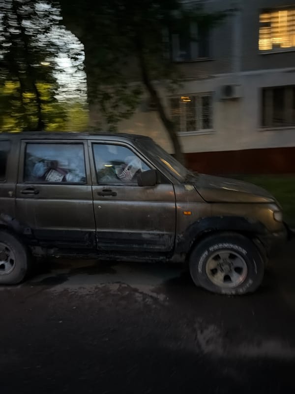 Moscow residents navigate wet evening streets after rainfall