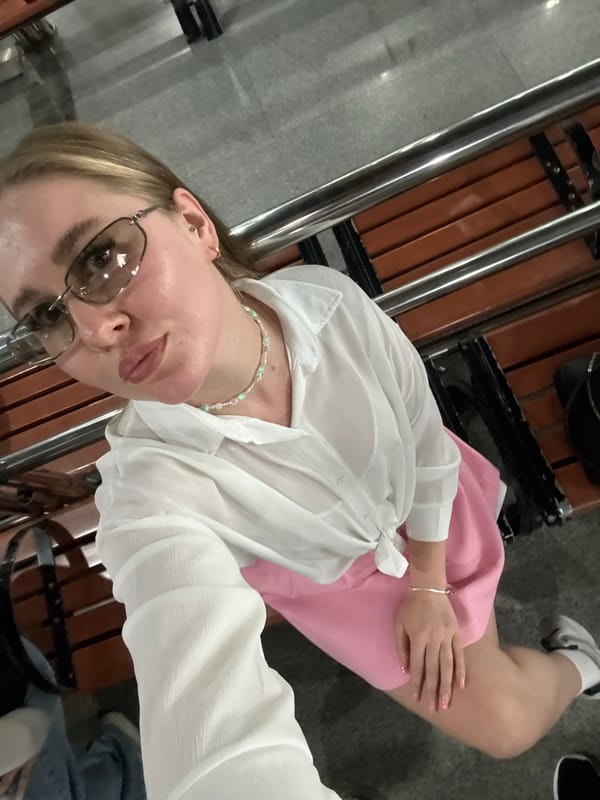 Tourist takes selfie on bench in Zhangjiajie