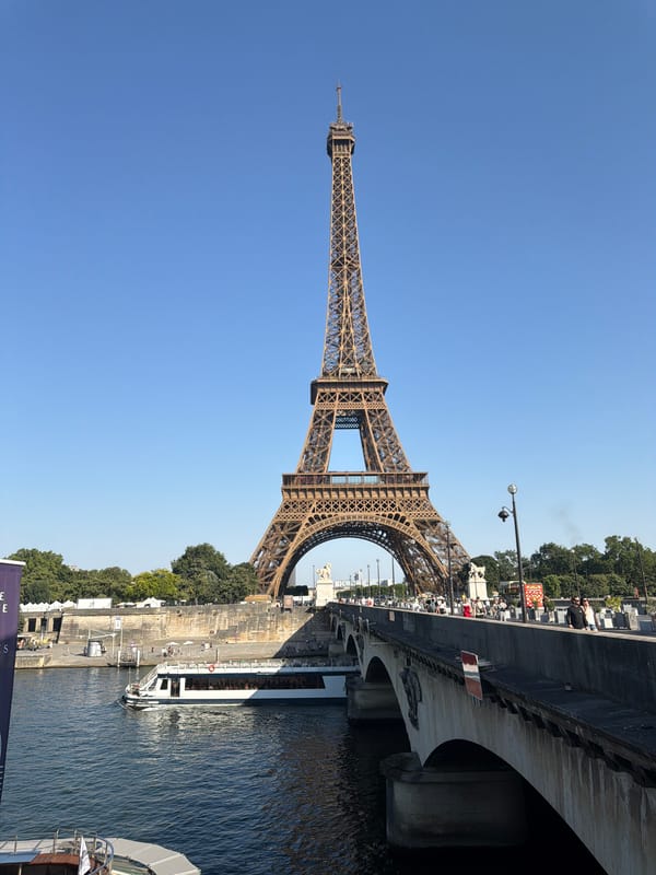 Eiffel Tower from two angles — river and ground level