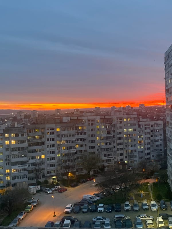 Sunset aerial view captured over Varna neighborhood from high-rise