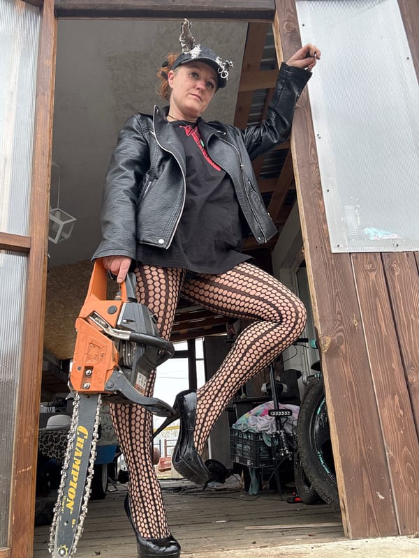 Woman with chainsaw spotted in unusual attire in Chaikovsky